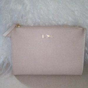 Donna Karan ivory folding makeup/wristlet/wallet pouch NWOT
